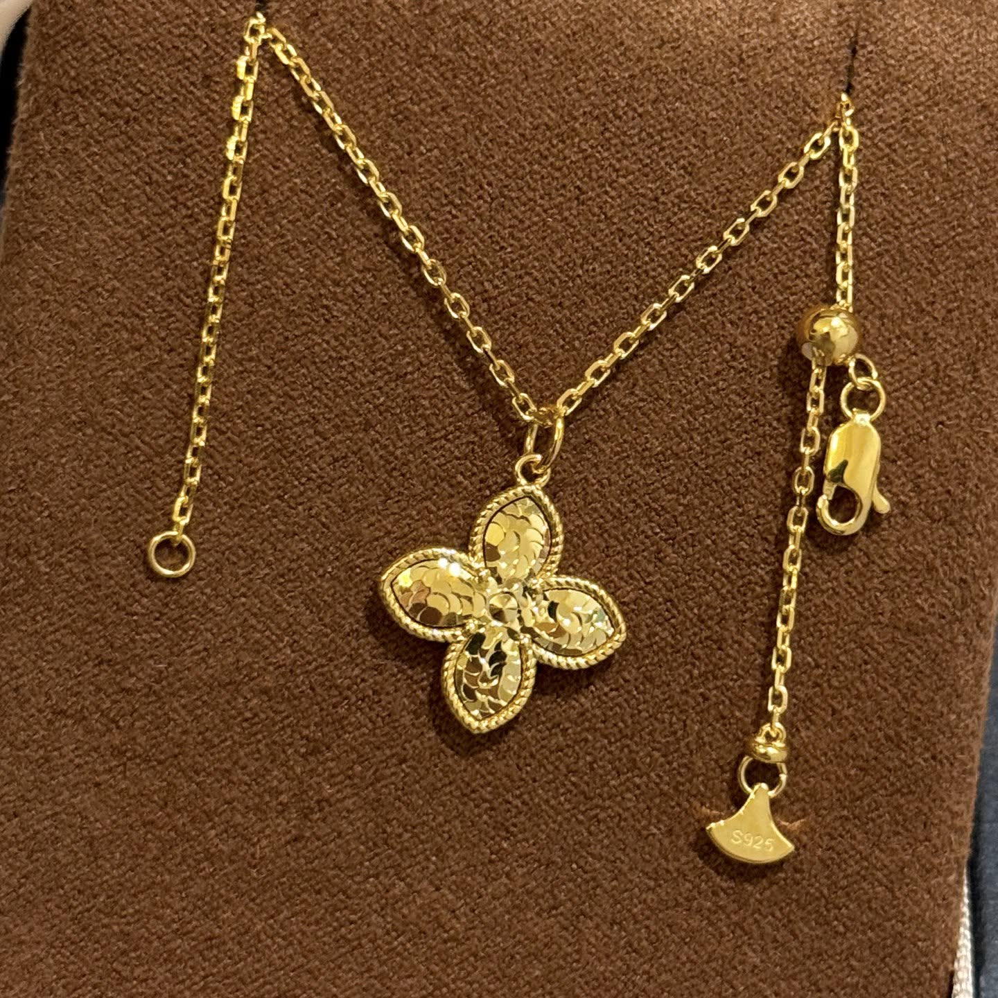 Van Cleef & Arpels Gold and Silver Flower Pendant Necklaces